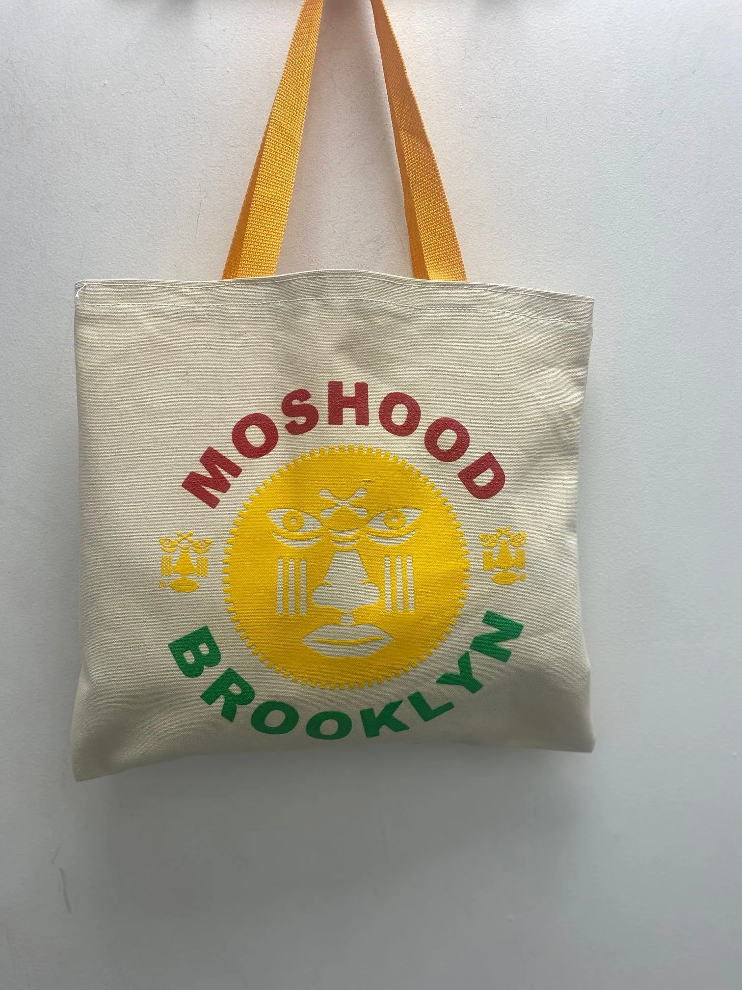 Moshood Tote Bags